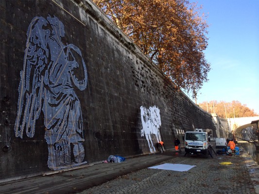 Site test for power washing of figures for frieze, Piazza Tevere, Rome, 2013
